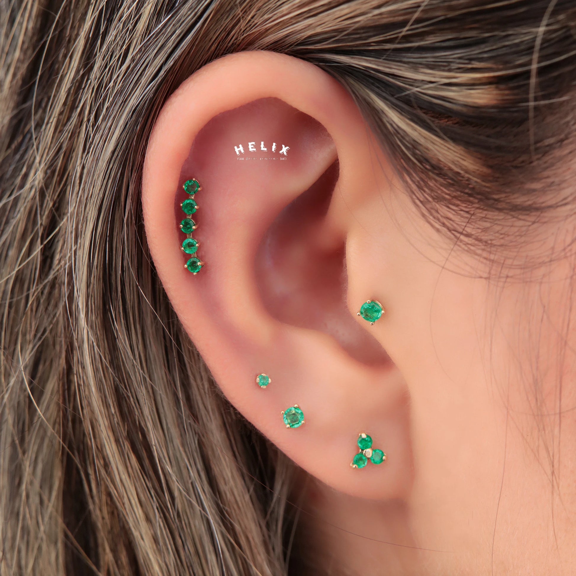 Labret en Oro 18K con Tres Esmeraldas Colombianas