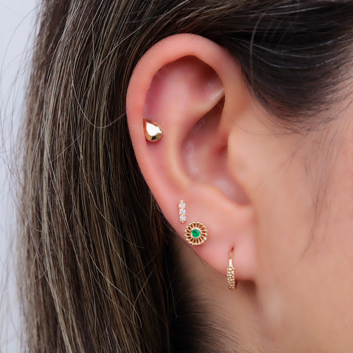 Labret Espiral en Oro 18K con Esmeralda Colombiana